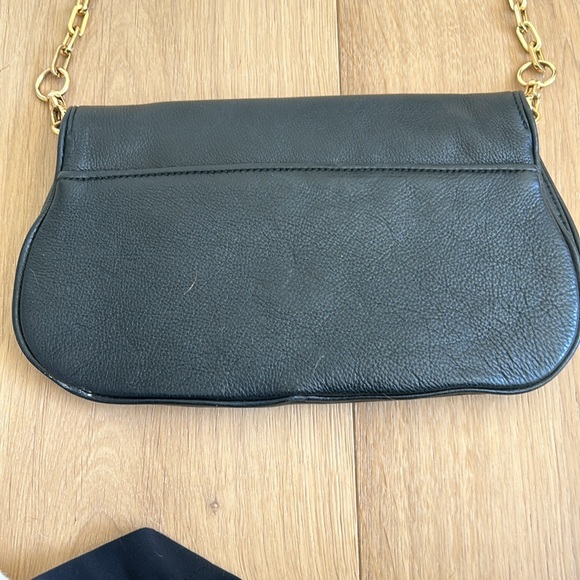Tory Burch Reva Cross body leather black flap bag with gold chain strap. - Picture 9 of 11